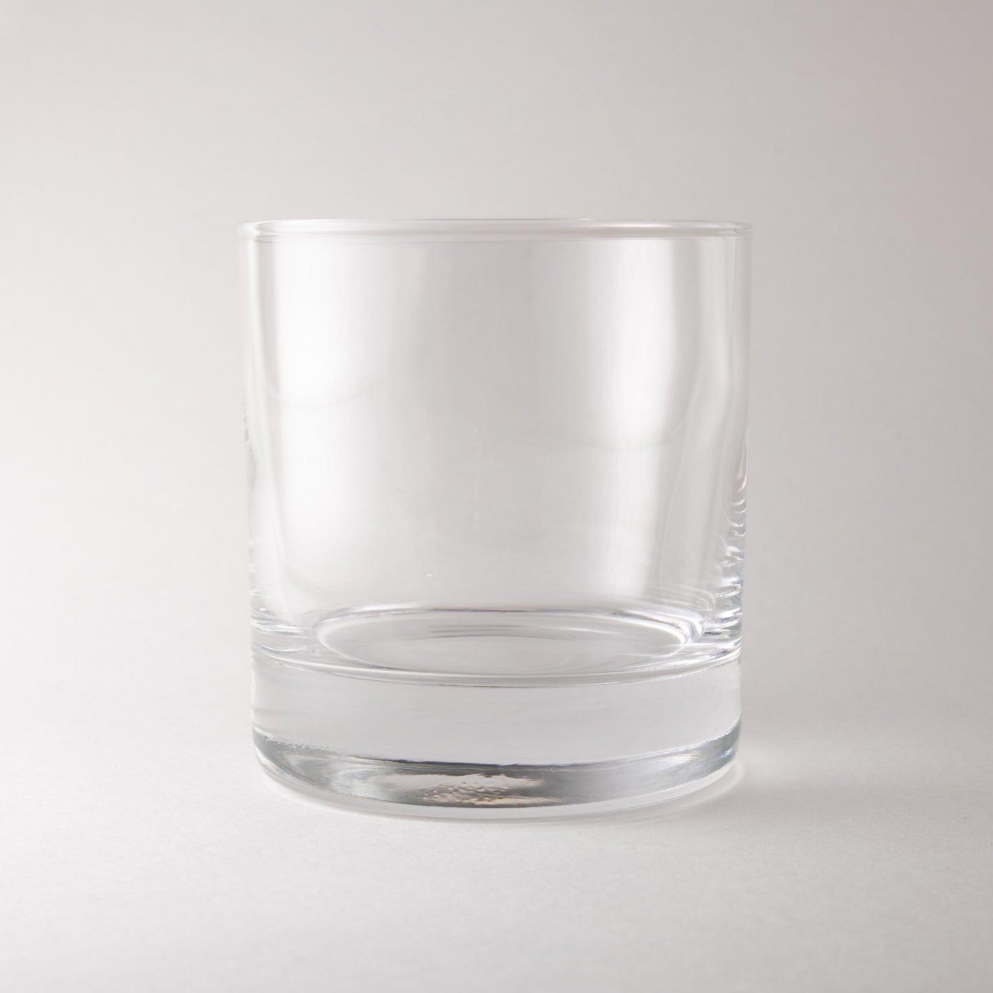 Canoe Candle Co's 12.75oz rocks glass on a plain white background.