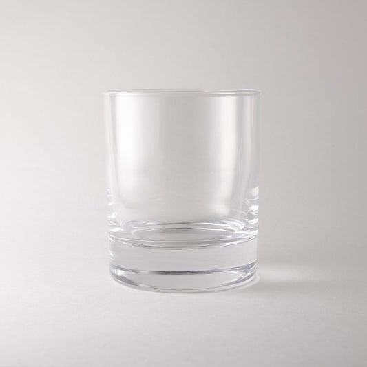 Canoe Candle Co's 7oz tealights rocks glass on a plain white background.