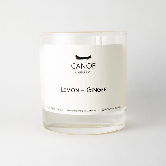 Canoe Candle Co.’s Lemon + Ginger 10oz soy wax candle on a plain white background.